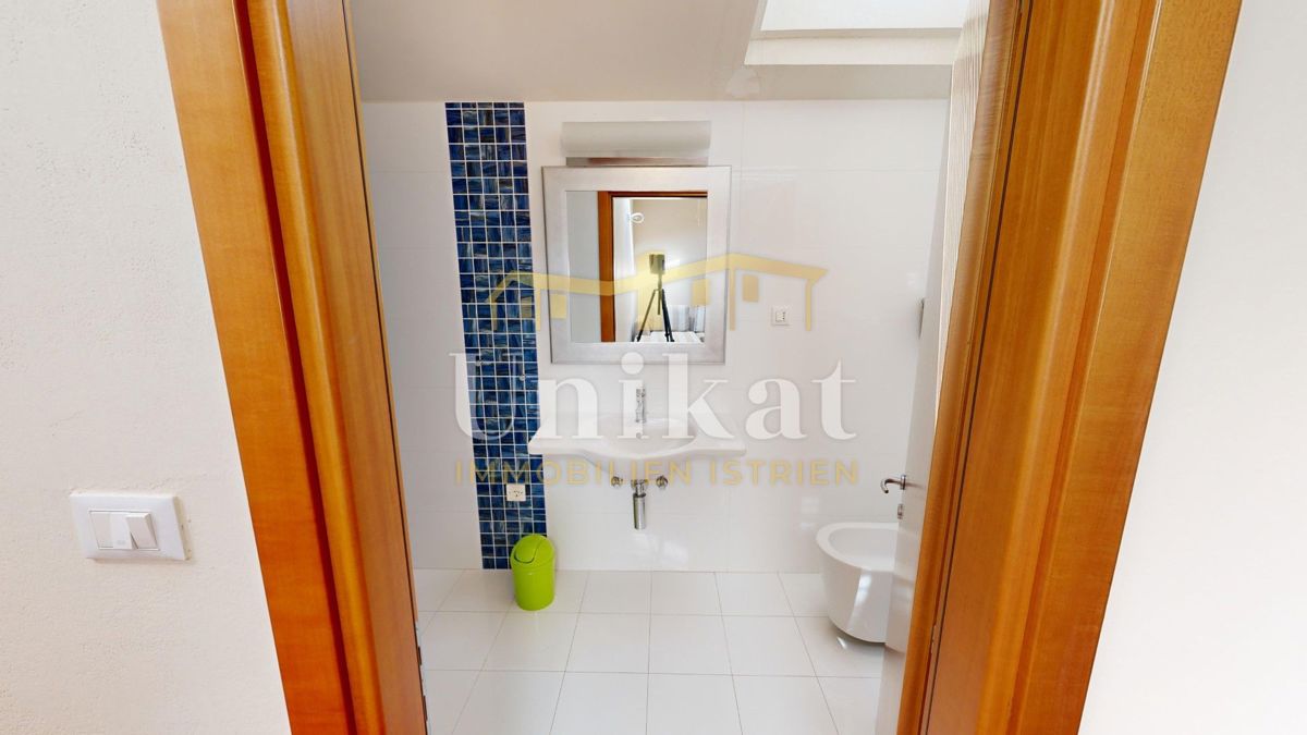 Appartamento su due piani con 4 camere da letto